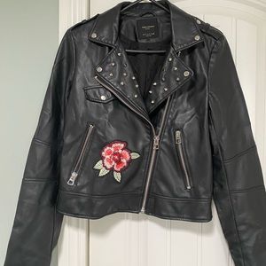 Leather jacked with studs and flowers